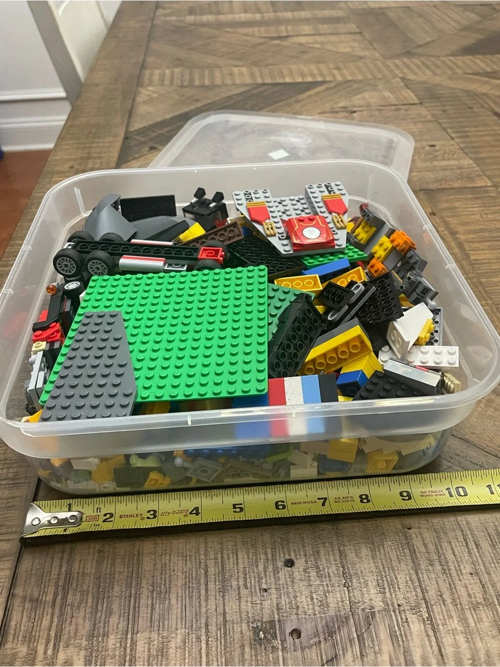 mixed assortment of LEGO brand bricks, plates, and specialty components